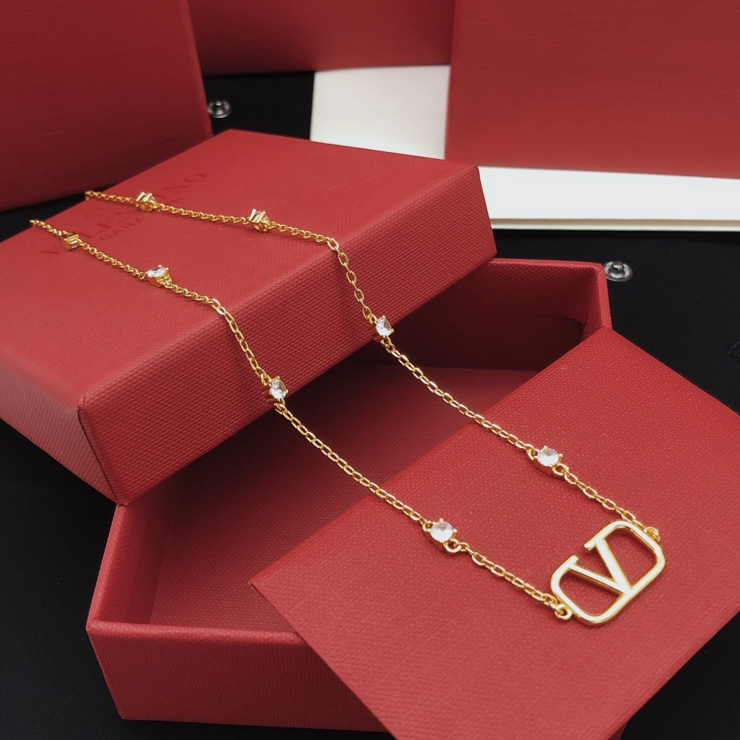 Martin Graham pendant necklace in polished metal-tone – front view