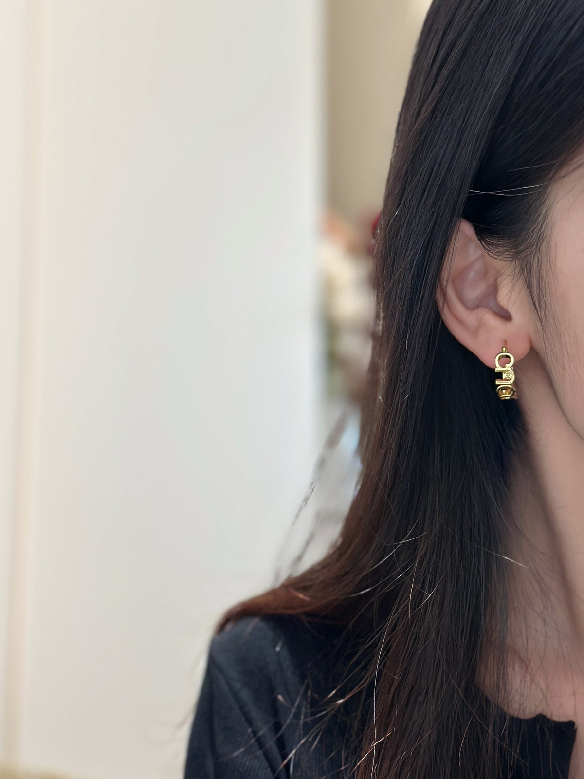 Martin Graham earrings in polished metal-tone – front product view