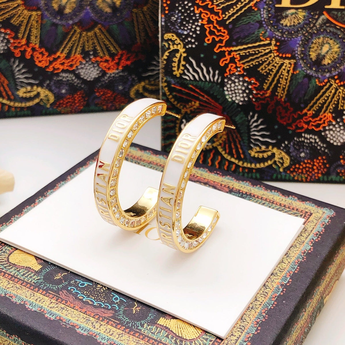 Martin Graham earrings in polished metal-tone – front view