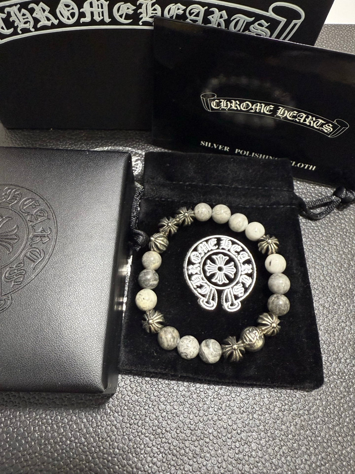 Martin Graham jewelry accessory in polished metal-tone – front product view