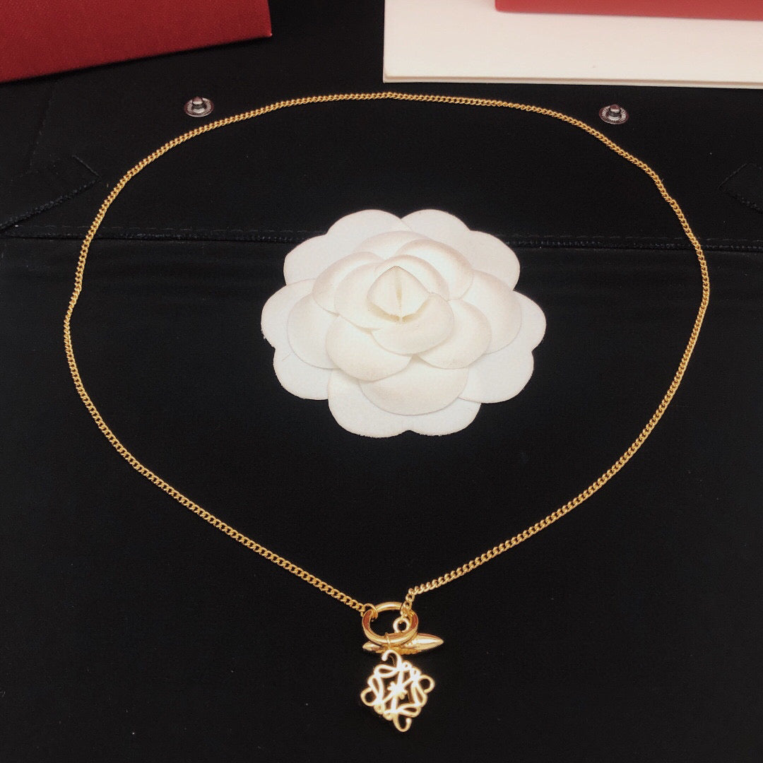 Martin Graham pendant necklace in polished metal-tone – front view