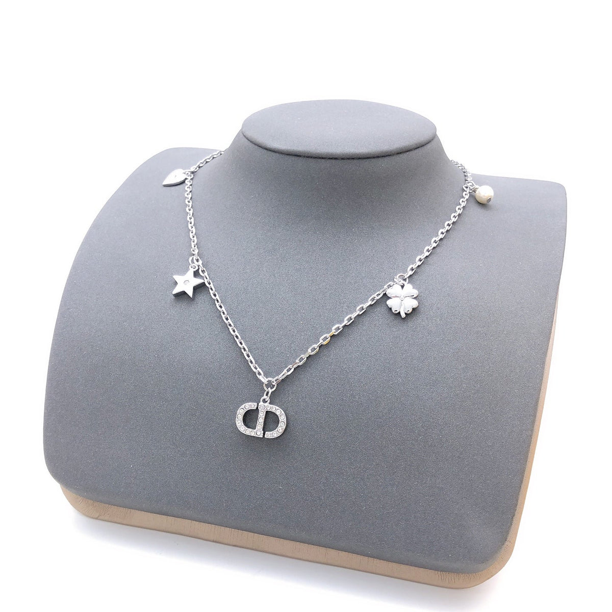 Martin Graham pendant necklace in polished metal-tone – front view