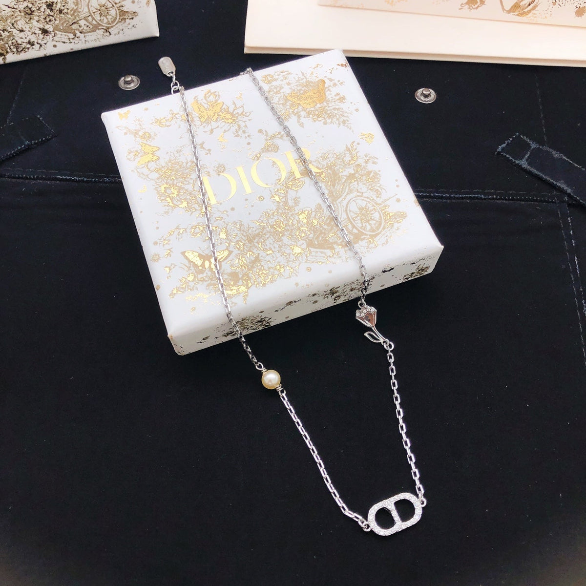Martin Graham pendant necklace in polished metal-tone – front view