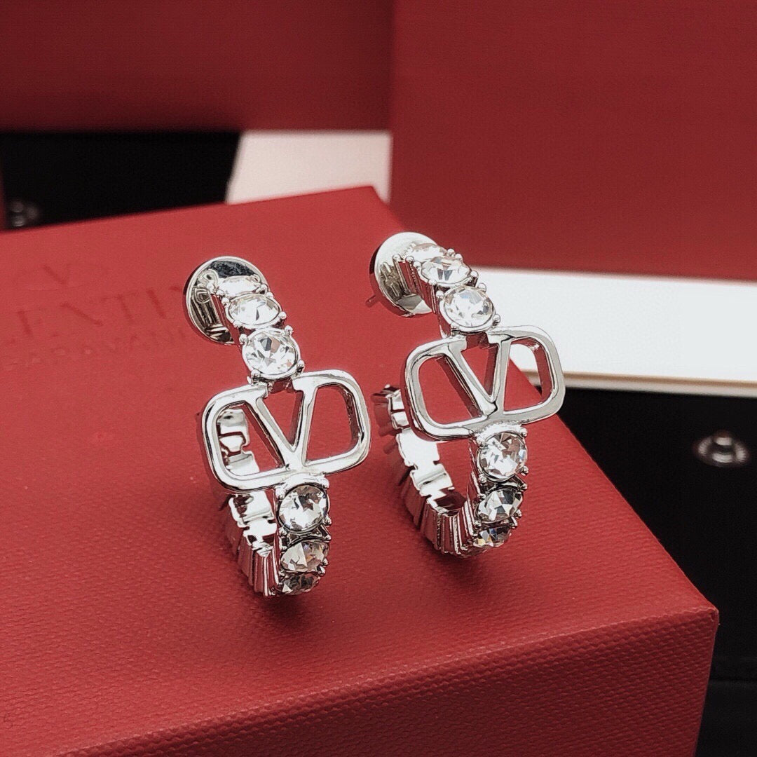 Martin Graham earrings in polished metal-tone – front view