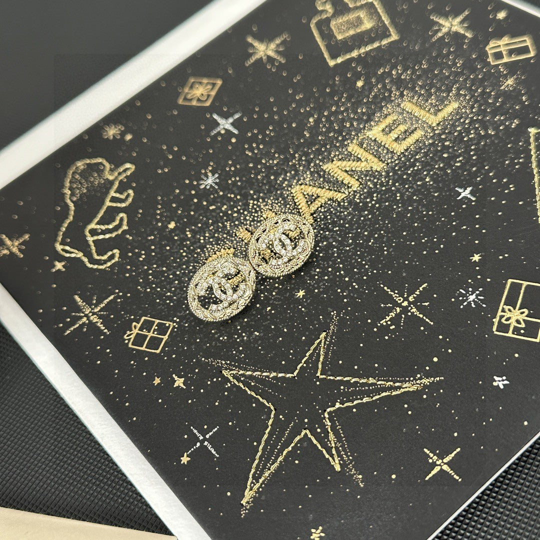 Martin Graham stud earrings in polished metal-tone – front product view