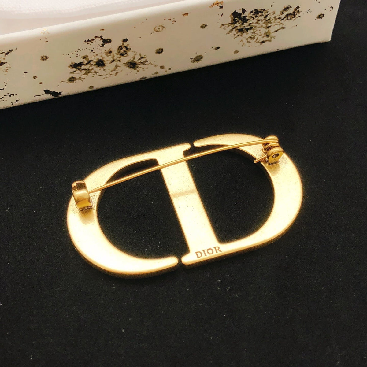 Martin Graham brooch in polished metal-tone – front view