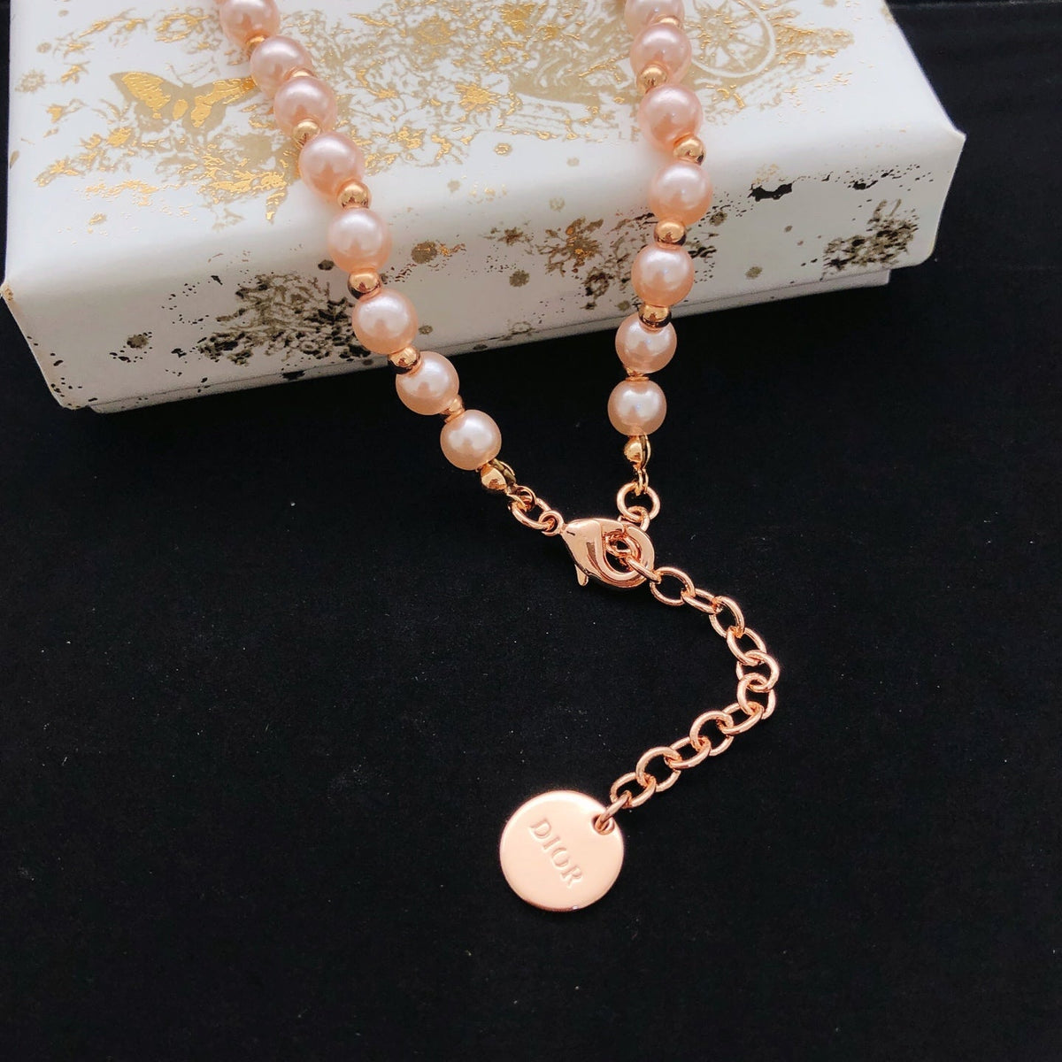 Martin Graham pendant necklace in polished metal-tone – front view