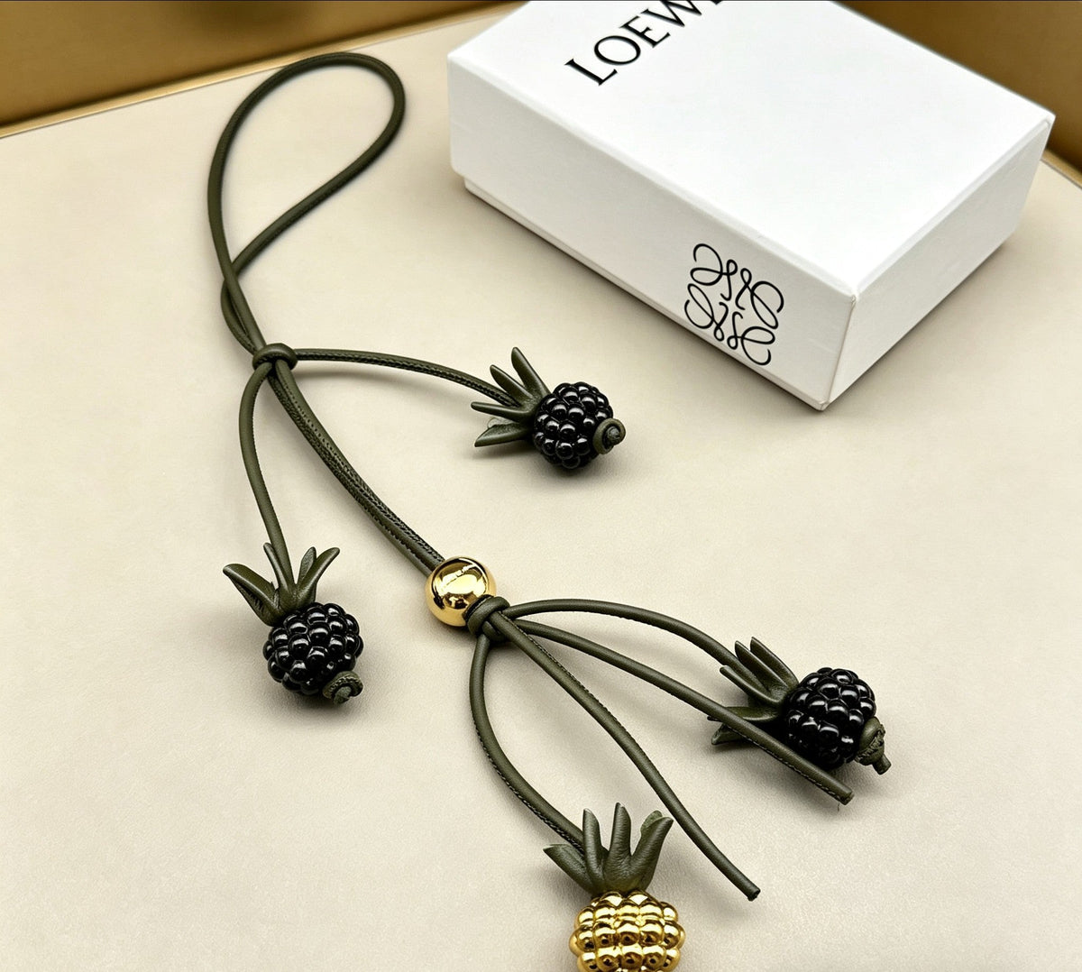 Martin Graham bag charm in polished metal-tone – front view
