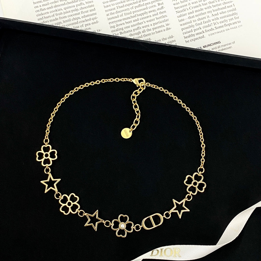 Martin Graham pendant necklace in polished metal-tone – front view
