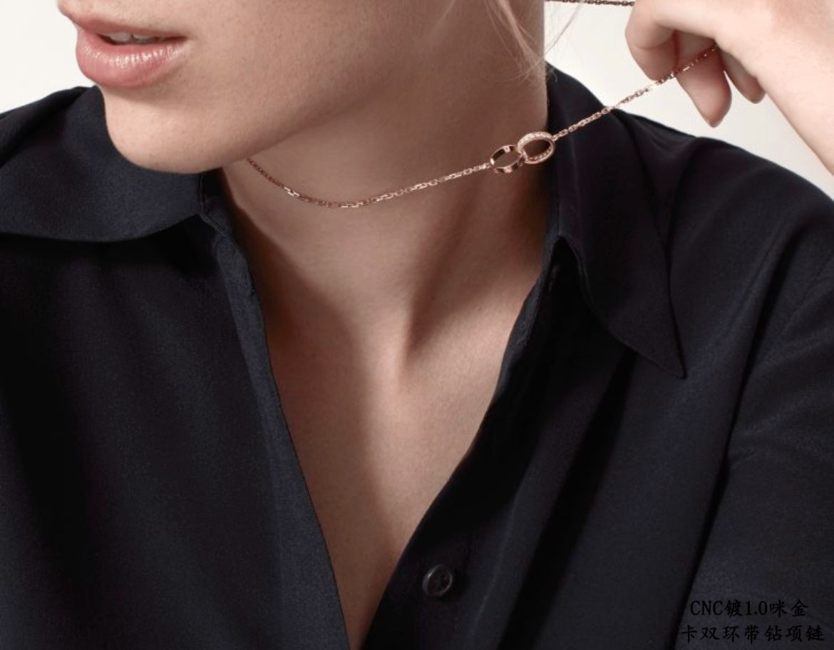 Martin Graham pendant necklace in polished metal-tone – front view