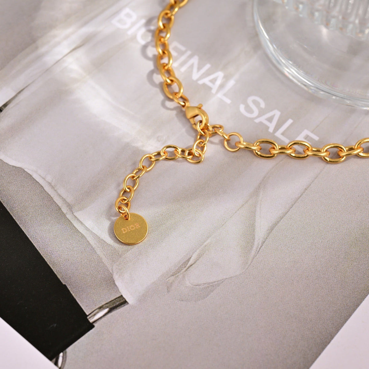 Martin Graham pendant necklace in polished metal-tone – front view