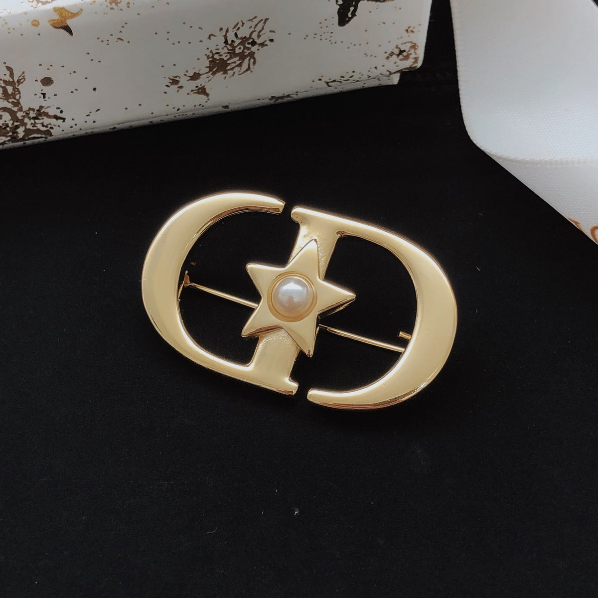 Martin Graham brooch in polished metal-tone – front view