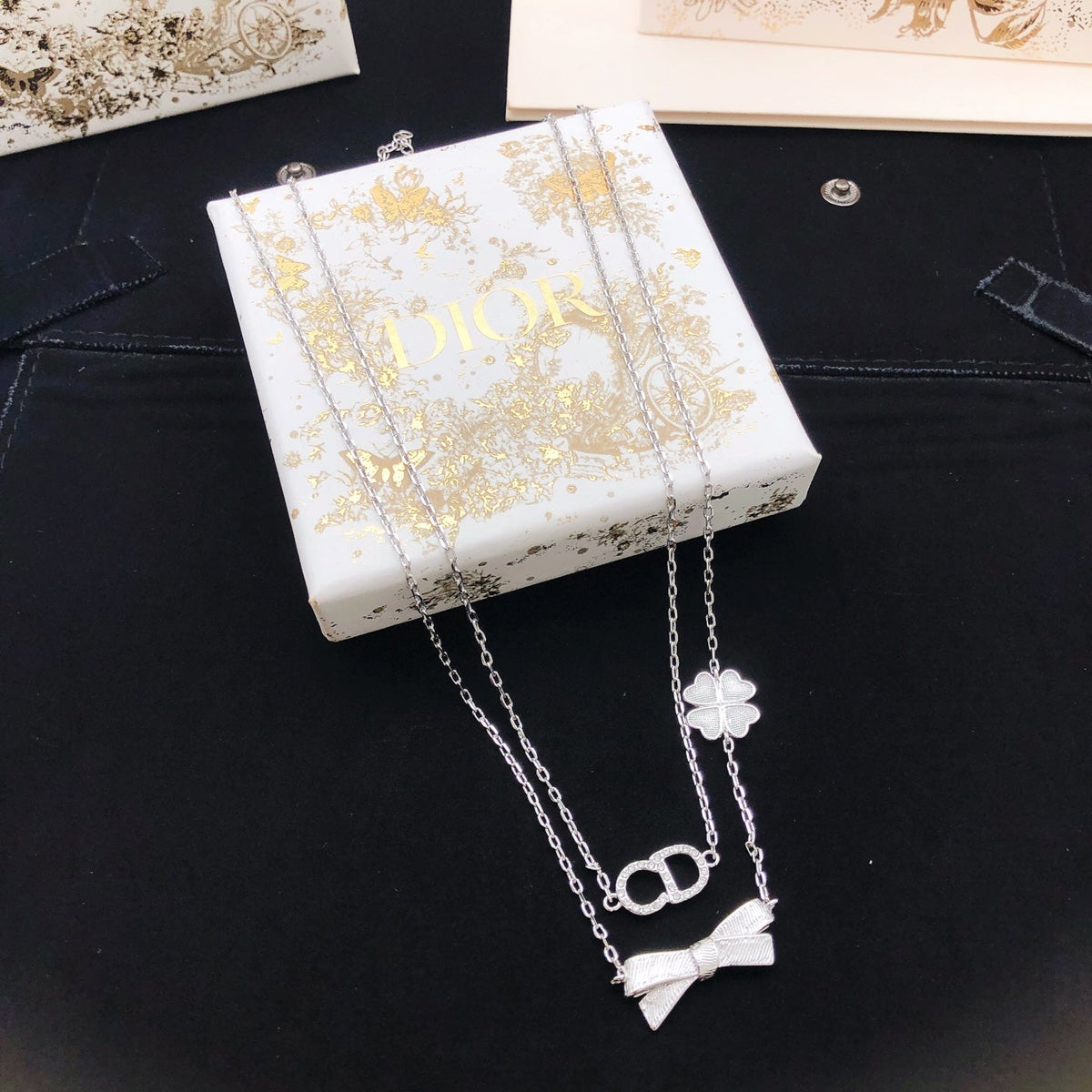 Martin Graham pendant necklace in polished metal-tone – front view