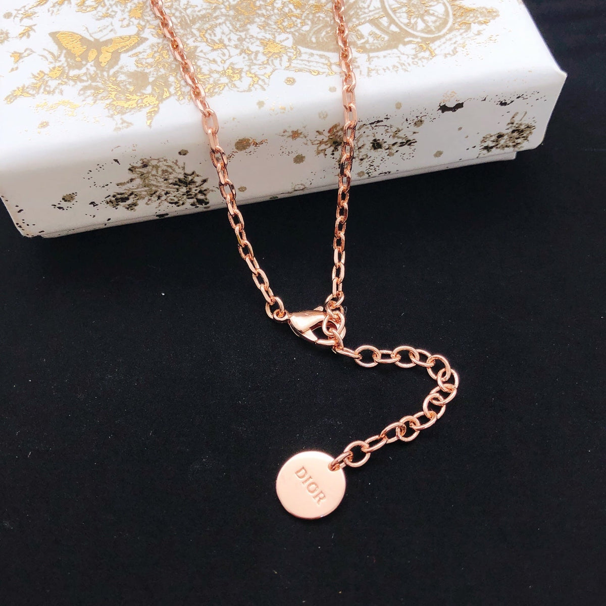 Martin Graham pendant necklace in polished metal-tone – front view