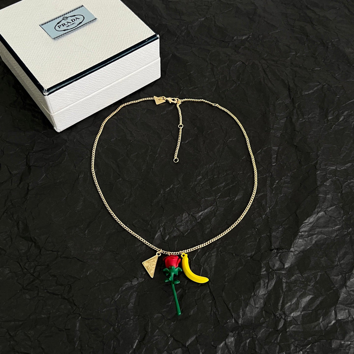 Martin Graham pendant necklace in polished metal-tone – front view
