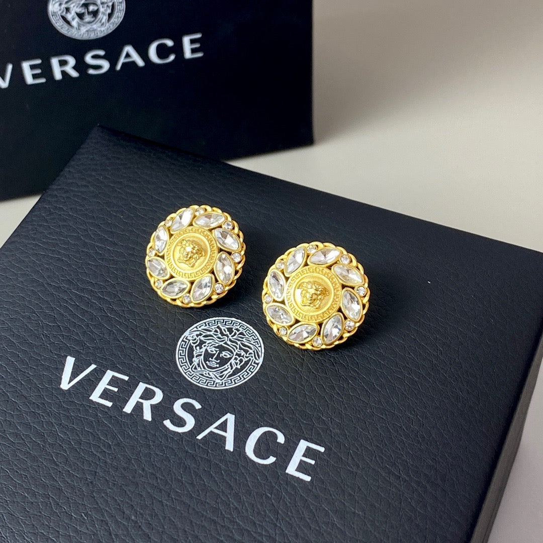 Martin Graham stud earrings in polished metal-tone – front product view