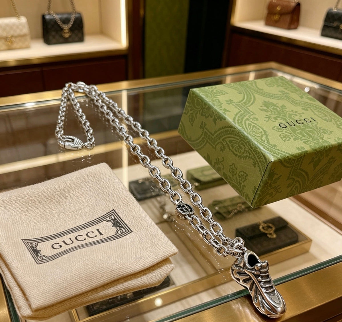 Martin Graham pendant necklace in polished metal-tone – front product view