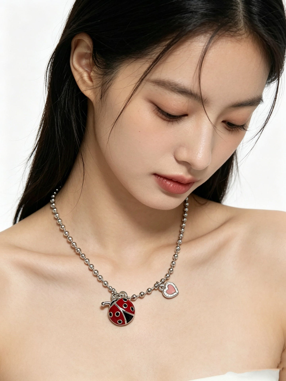 Martin Graham pendant necklace in polished metal-tone – front product view