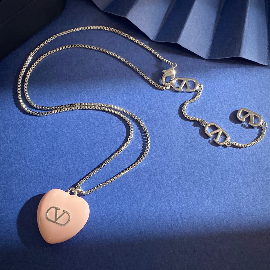 Martin Graham pendant necklace in polished metal-tone – front view