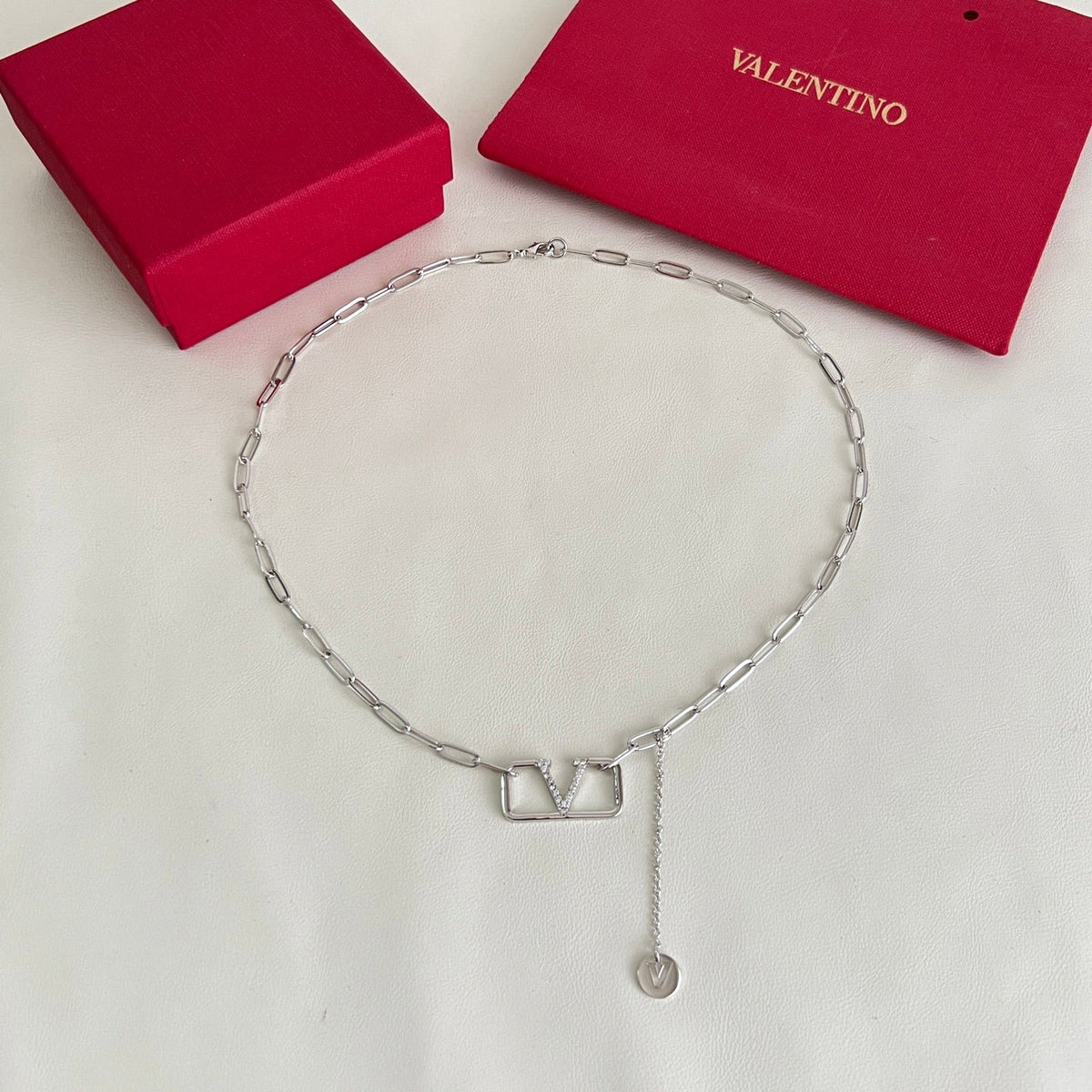 Martin Graham pendant necklace in polished metal-tone – front view