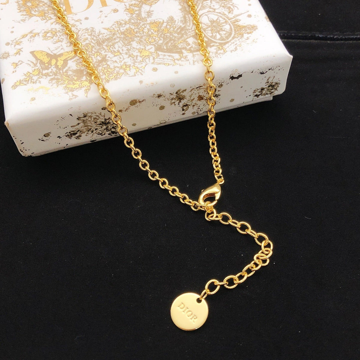 Martin Graham pendant necklace in polished metal-tone – front view