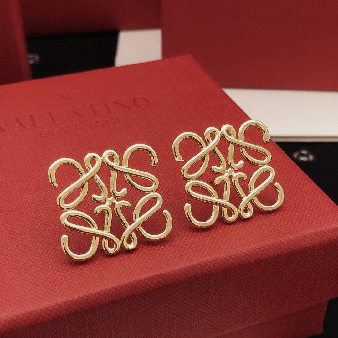 Martin Graham stud earrings in polished metal-tone – front view