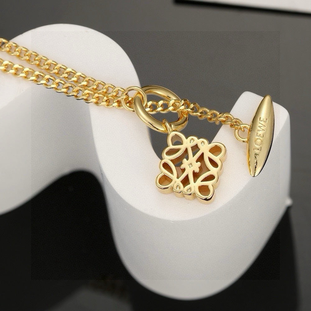 Martin Graham pendant necklace in polished metal-tone – front view