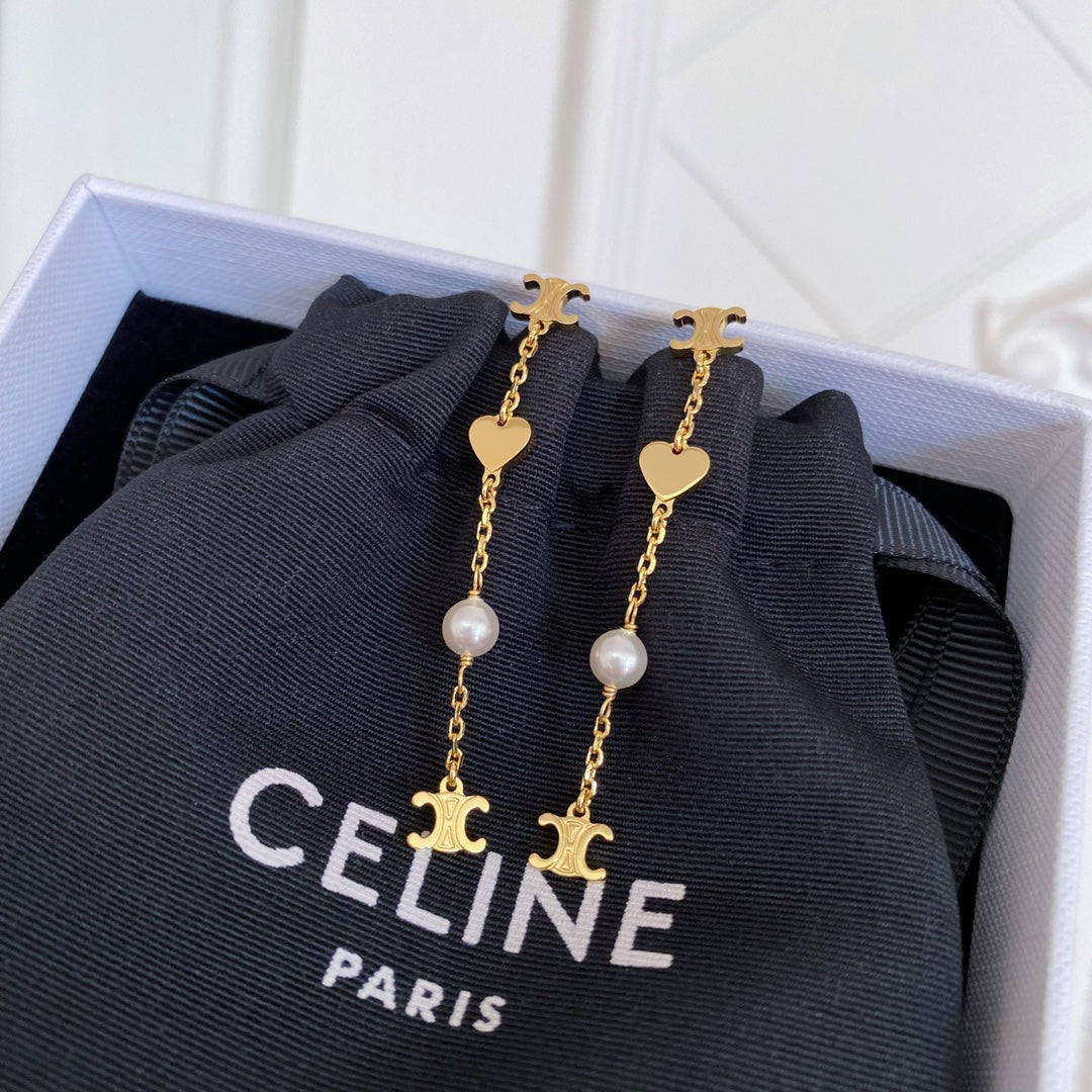 Martin Graham earrings in polished metal-tone – front view