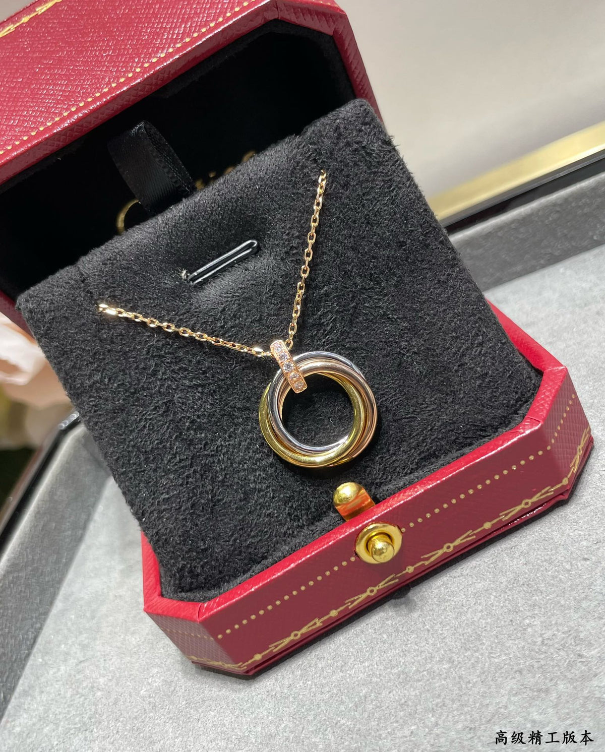 Martin Graham pendant necklace in polished metal-tone – front view