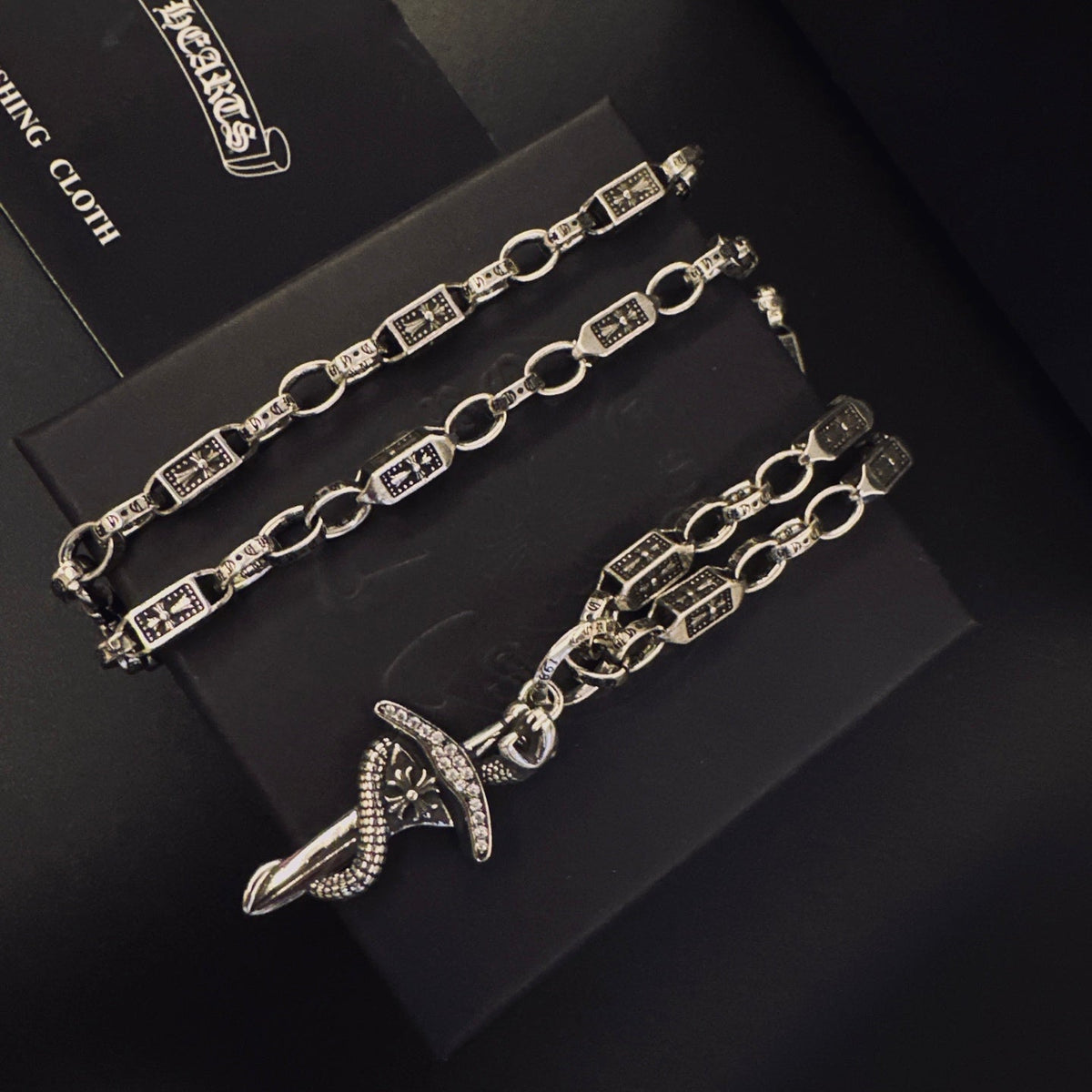 Martin Graham pendant necklace in polished metal-tone – front product view