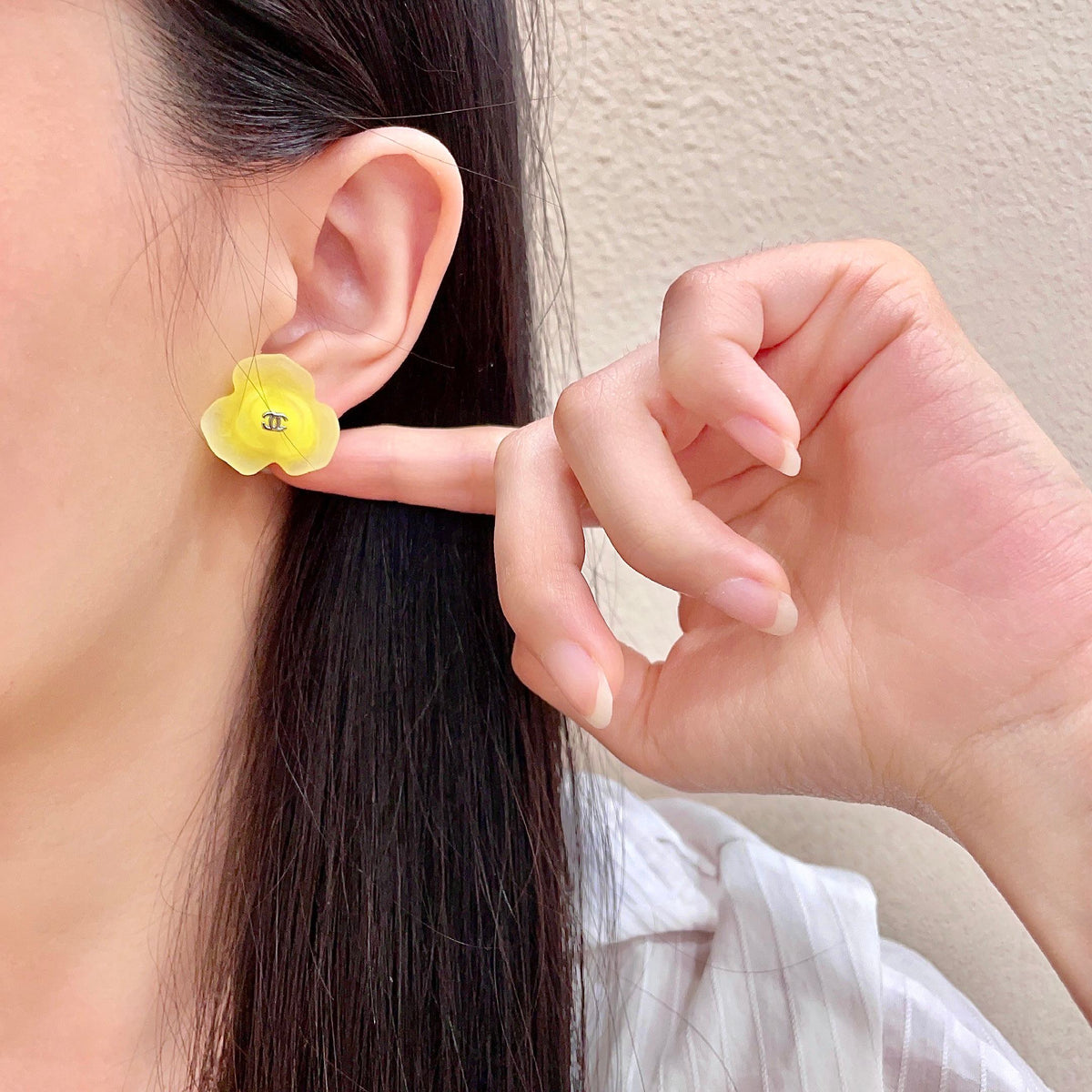 Martin Graham stud earrings in polished metal-tone – front product view