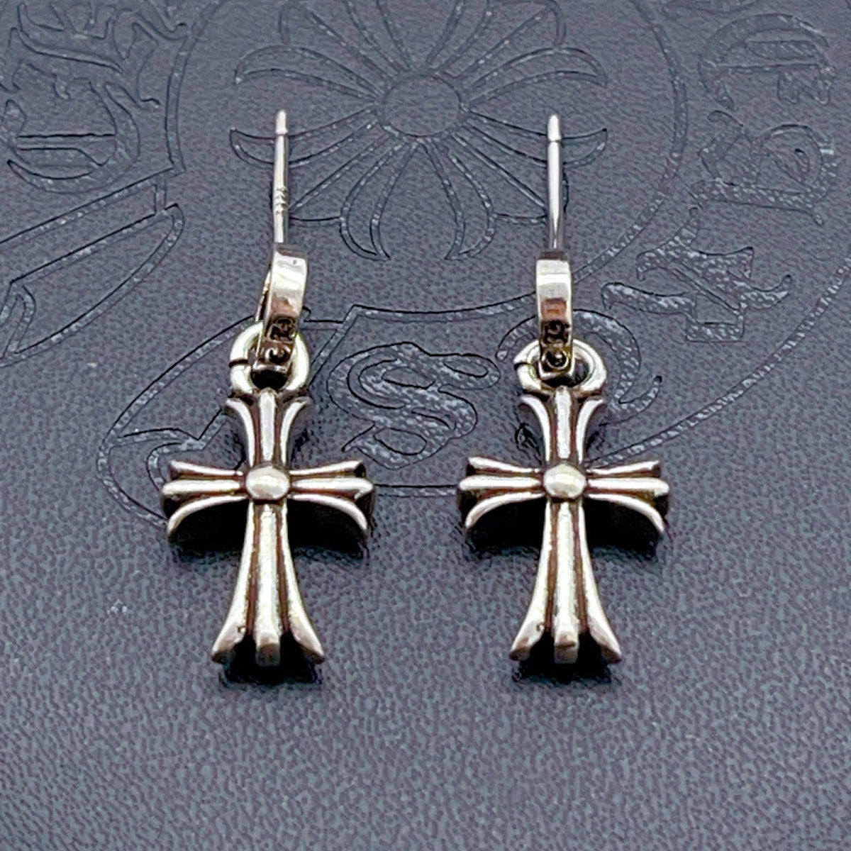 Martin Graham stud earrings in polished metal-tone – front product view