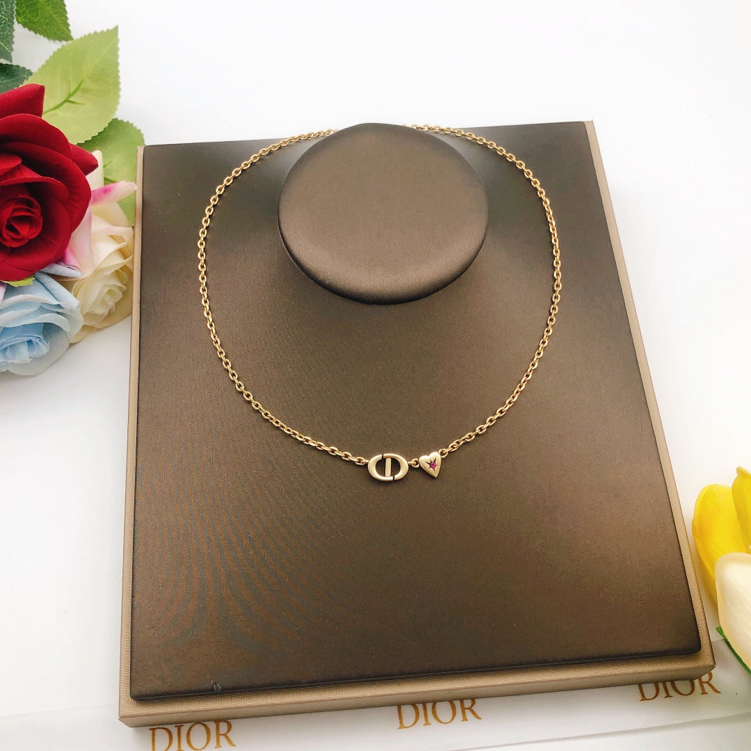 Martin Graham pendant necklace in polished metal-tone – front view