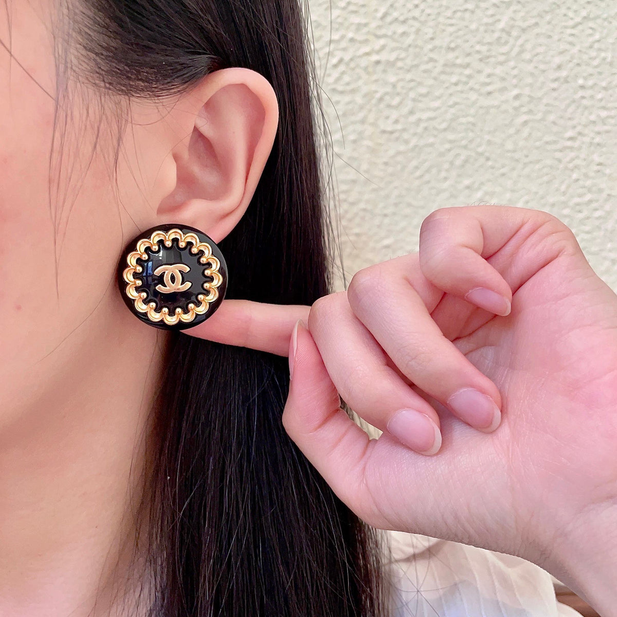 Martin Graham stud earrings in polished metal-tone – front product view