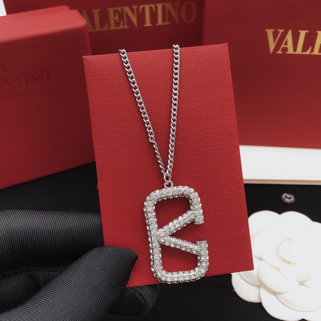 Martin Graham pendant necklace in polished metal-tone – front view