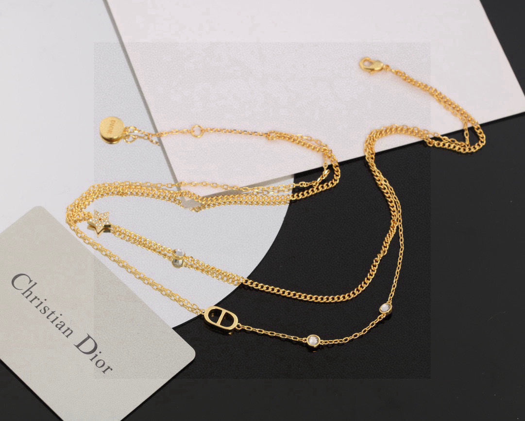 Martin Graham pendant necklace in polished metal-tone – front view