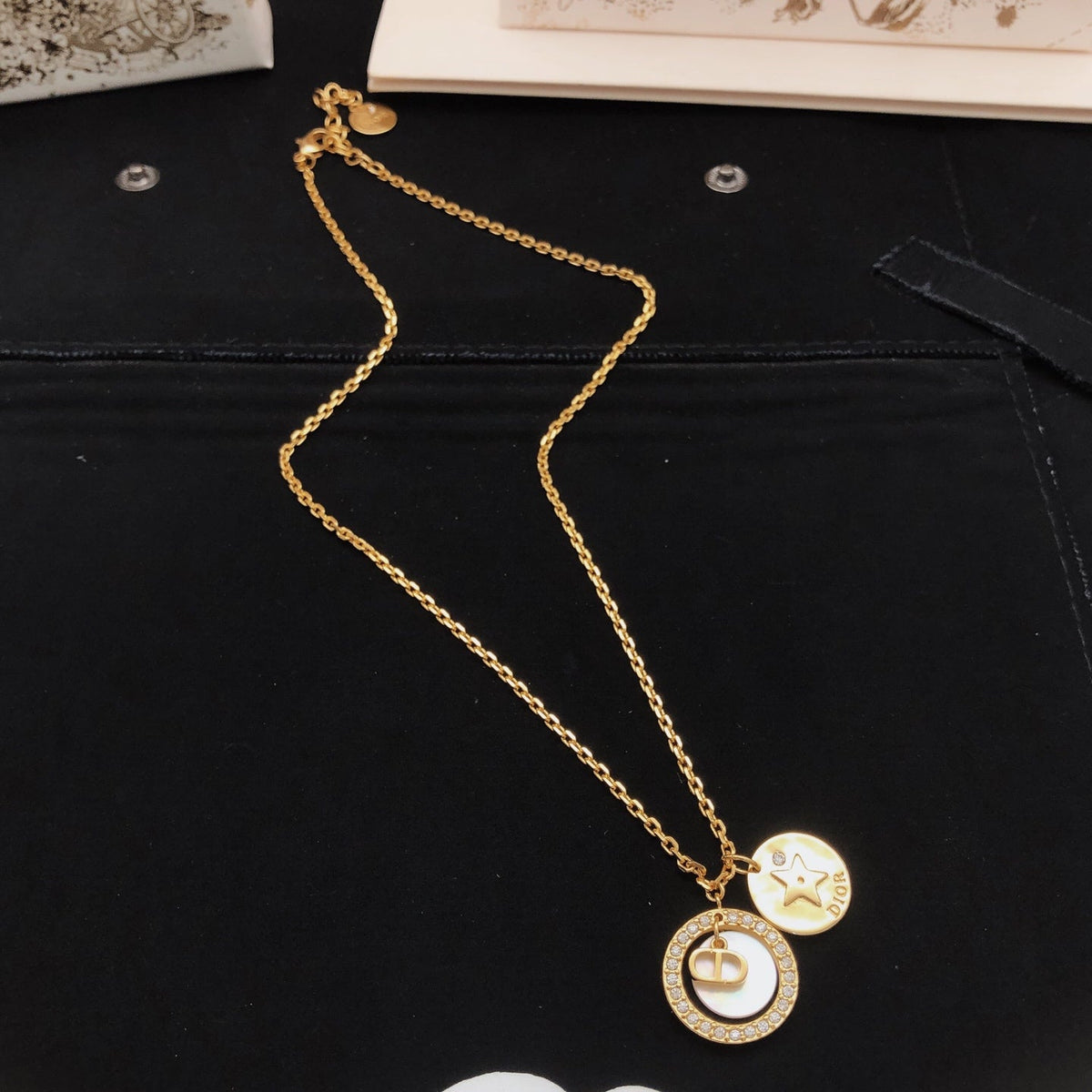 Martin Graham pendant necklace in polished metal-tone – front view