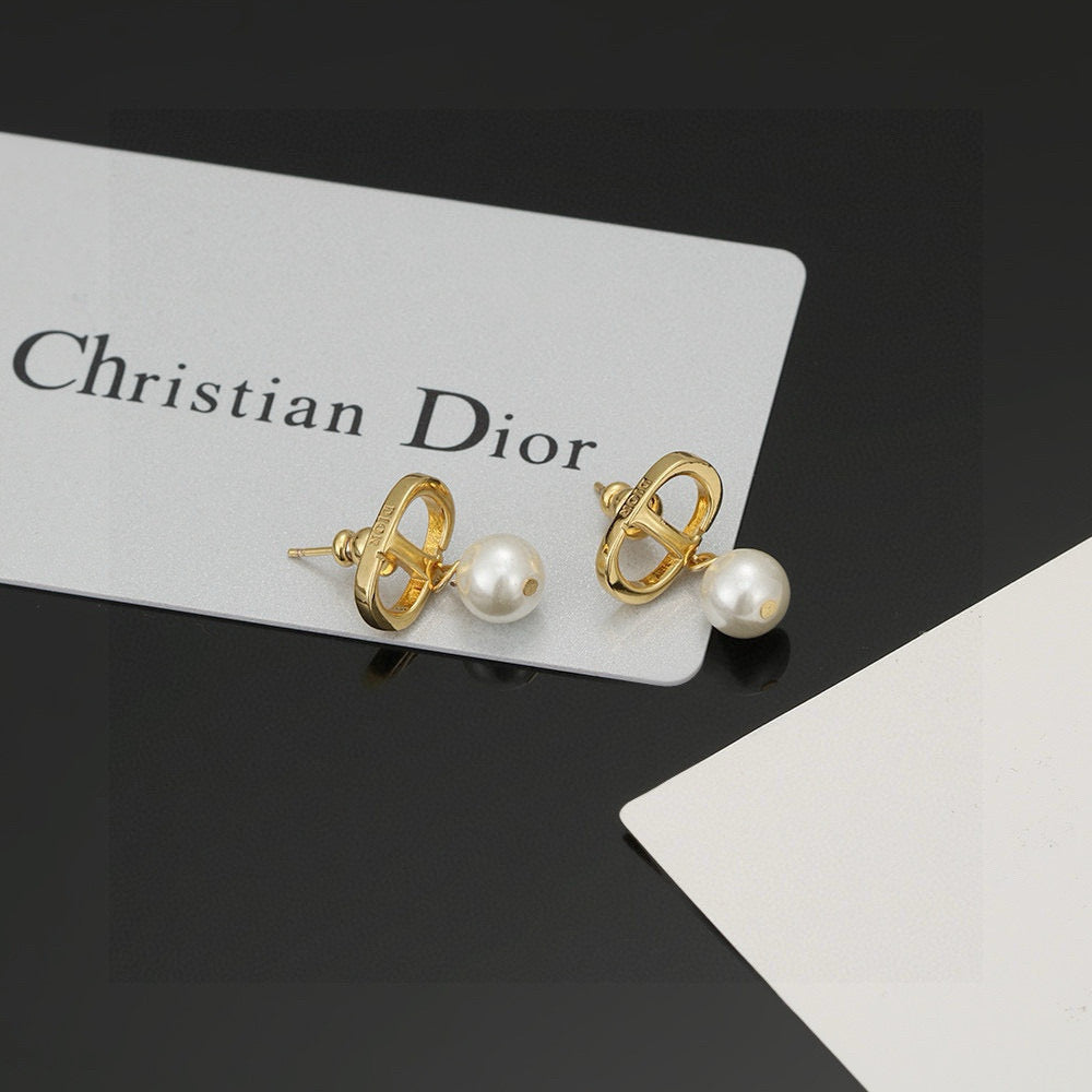 Martin Graham stud earrings in polished metal-tone – front view