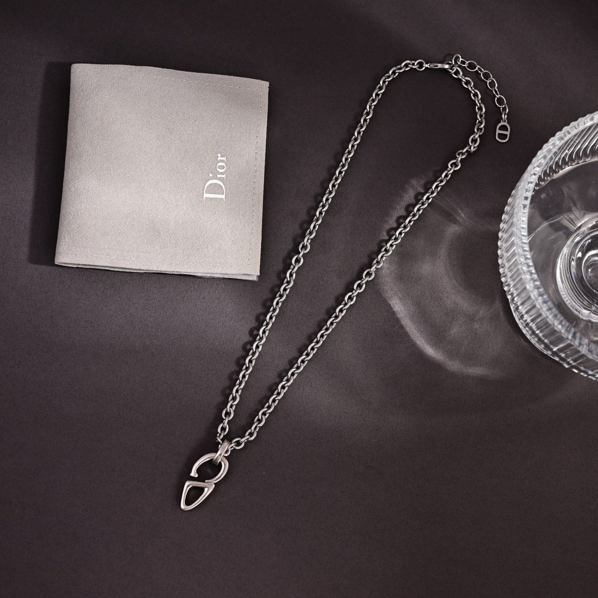 Martin Graham pendant necklace in polished metal-tone – front view