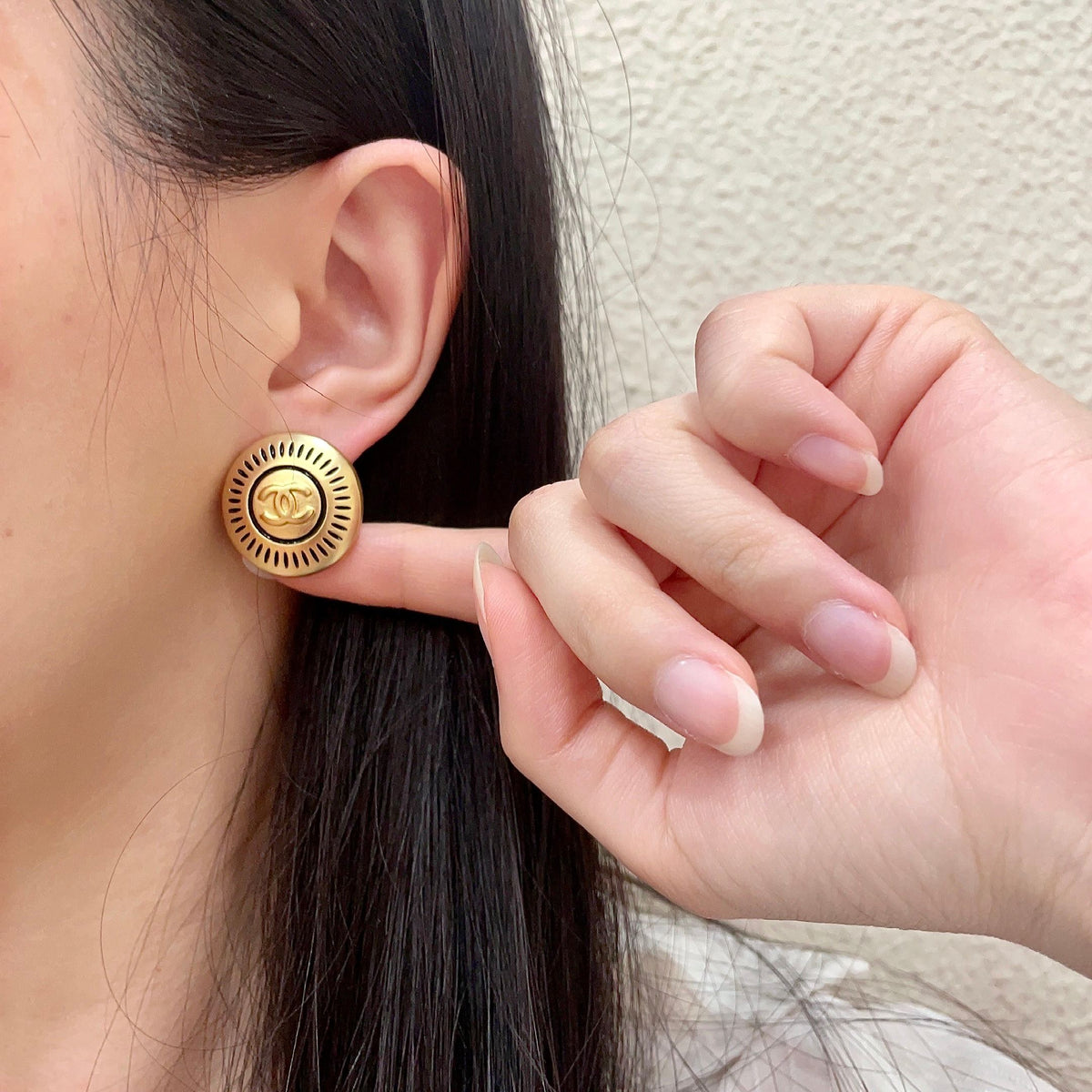 Martin Graham stud earrings in polished metal-tone – front product view
