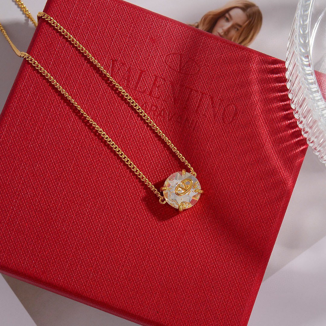 Martin Graham pendant necklace in polished metal-tone – front view