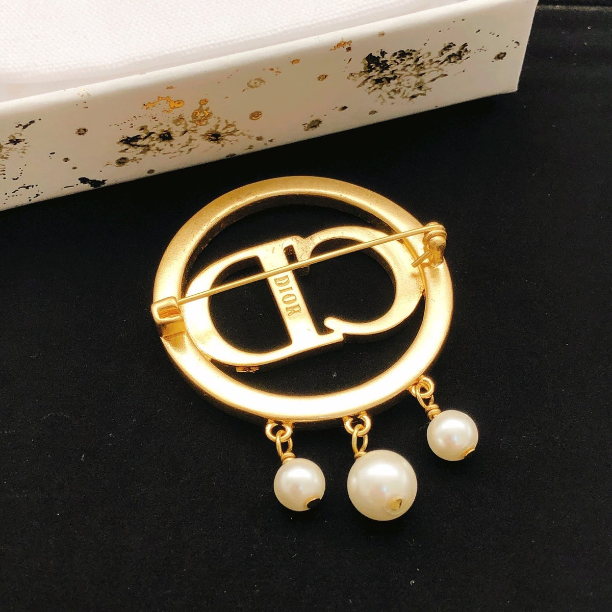 Martin Graham brooch in polished metal-tone – front view
