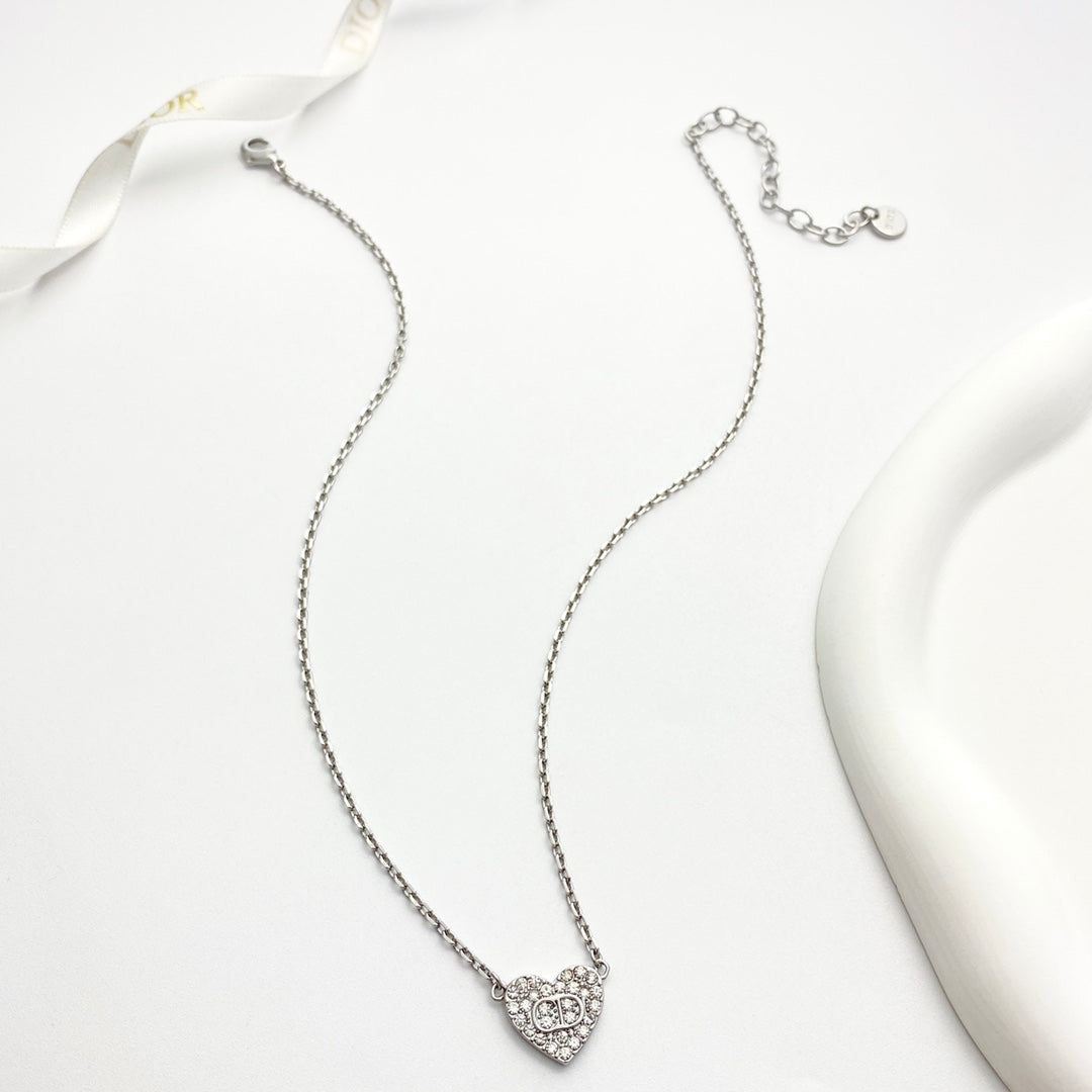 Martin Graham pendant necklace in polished metal-tone – front view