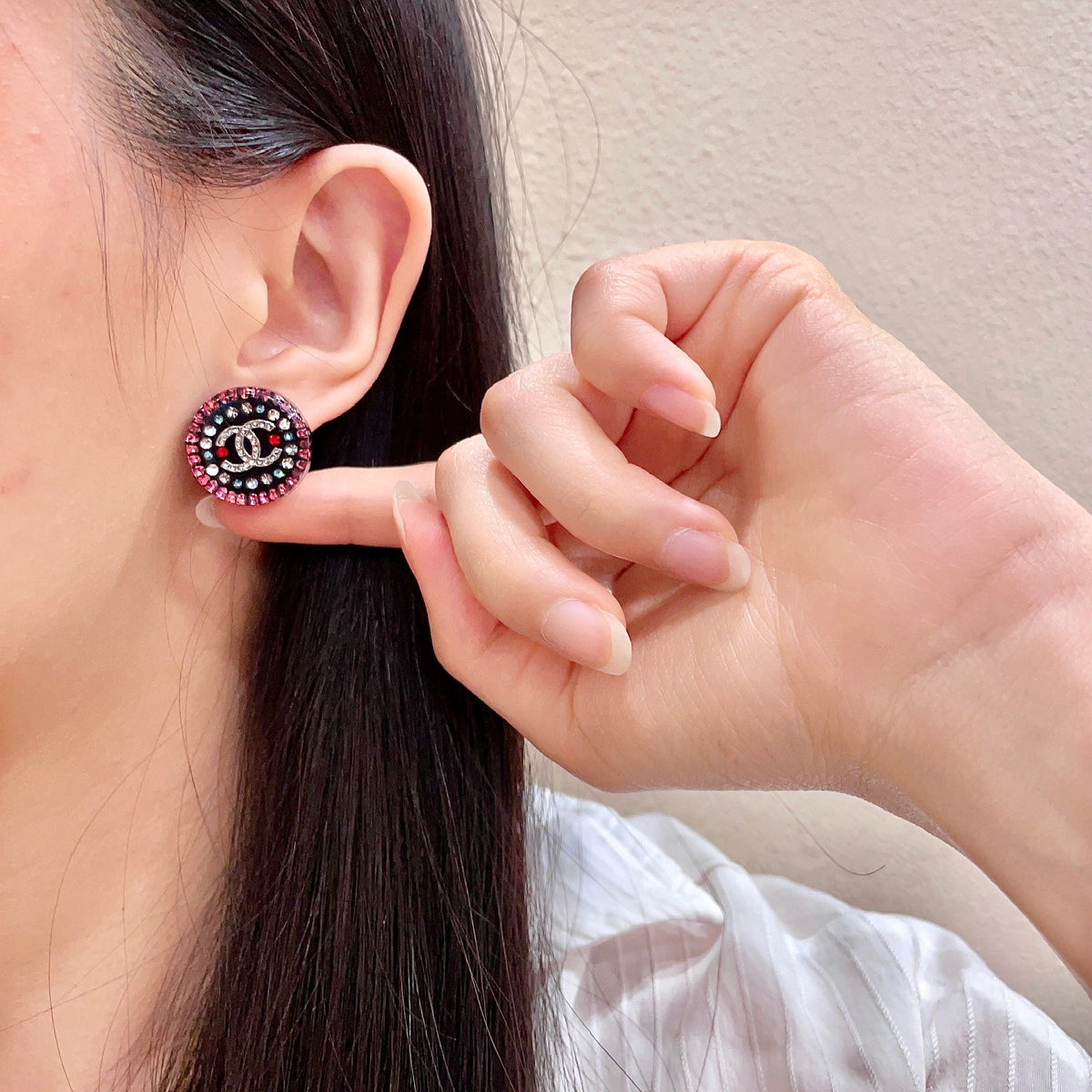 Martin Graham stud earrings in polished metal-tone – front product view