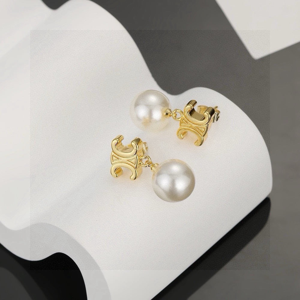 Martin Graham stud earrings in polished metal-tone – front view