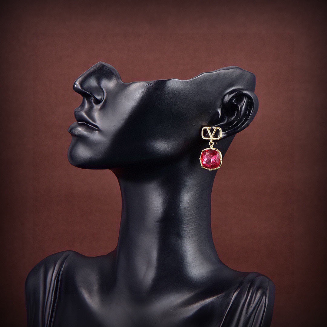 Martin Graham stud earrings in polished metal-tone – front view