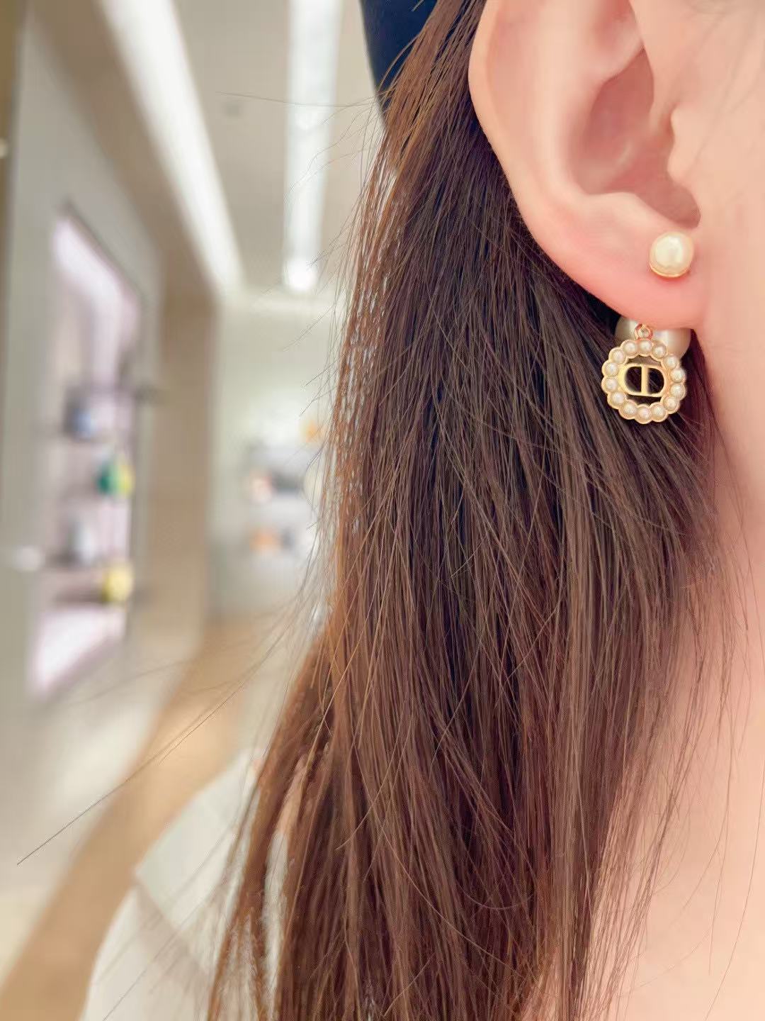 Martin Graham earrings in polished metal-tone – front view