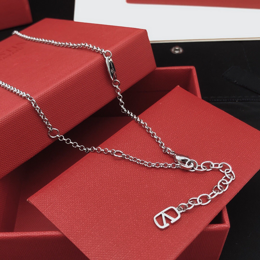 Martin Graham pendant necklace in polished metal-tone – front view