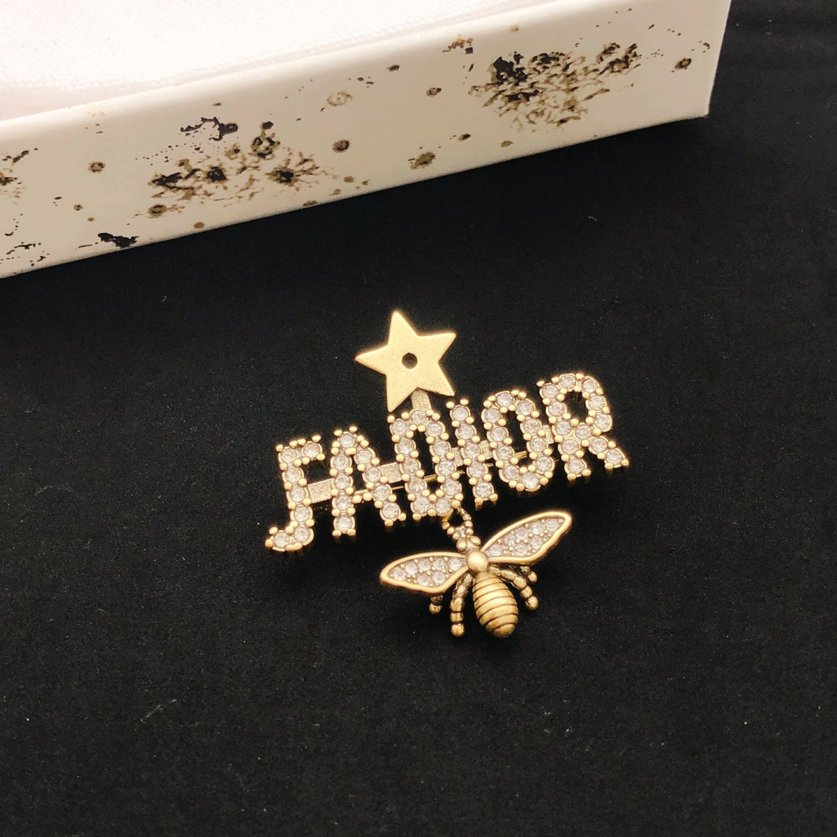 Martin Graham brooch in polished metal-tone – front view