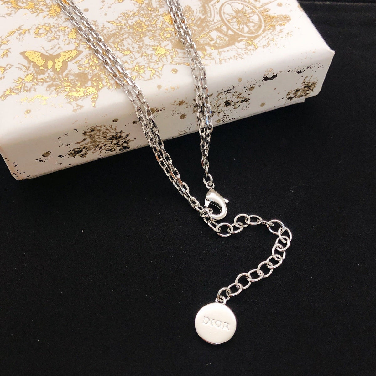 Martin Graham pendant necklace in polished metal-tone – front view